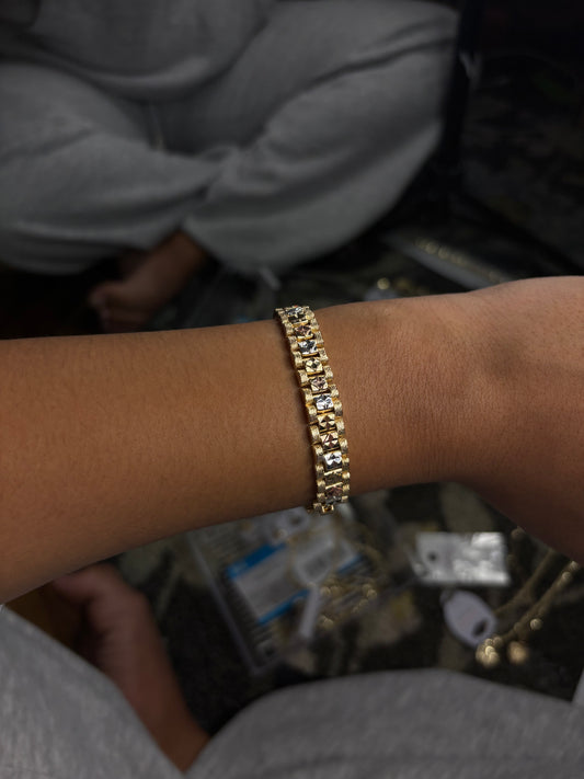 Gold Rolex with Diamond cuts